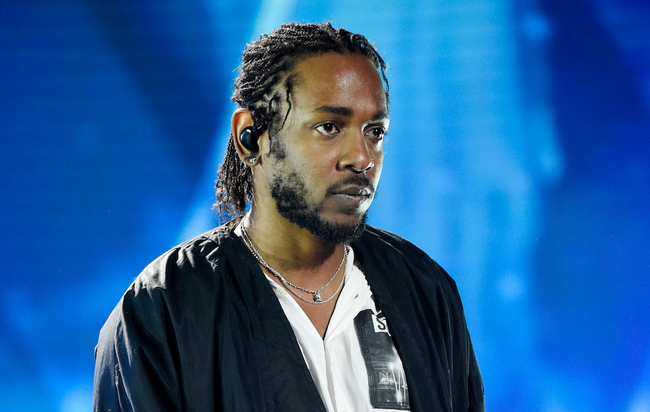Kendrick Lamar Kicks Fan Off Stage After Singing Chorus
